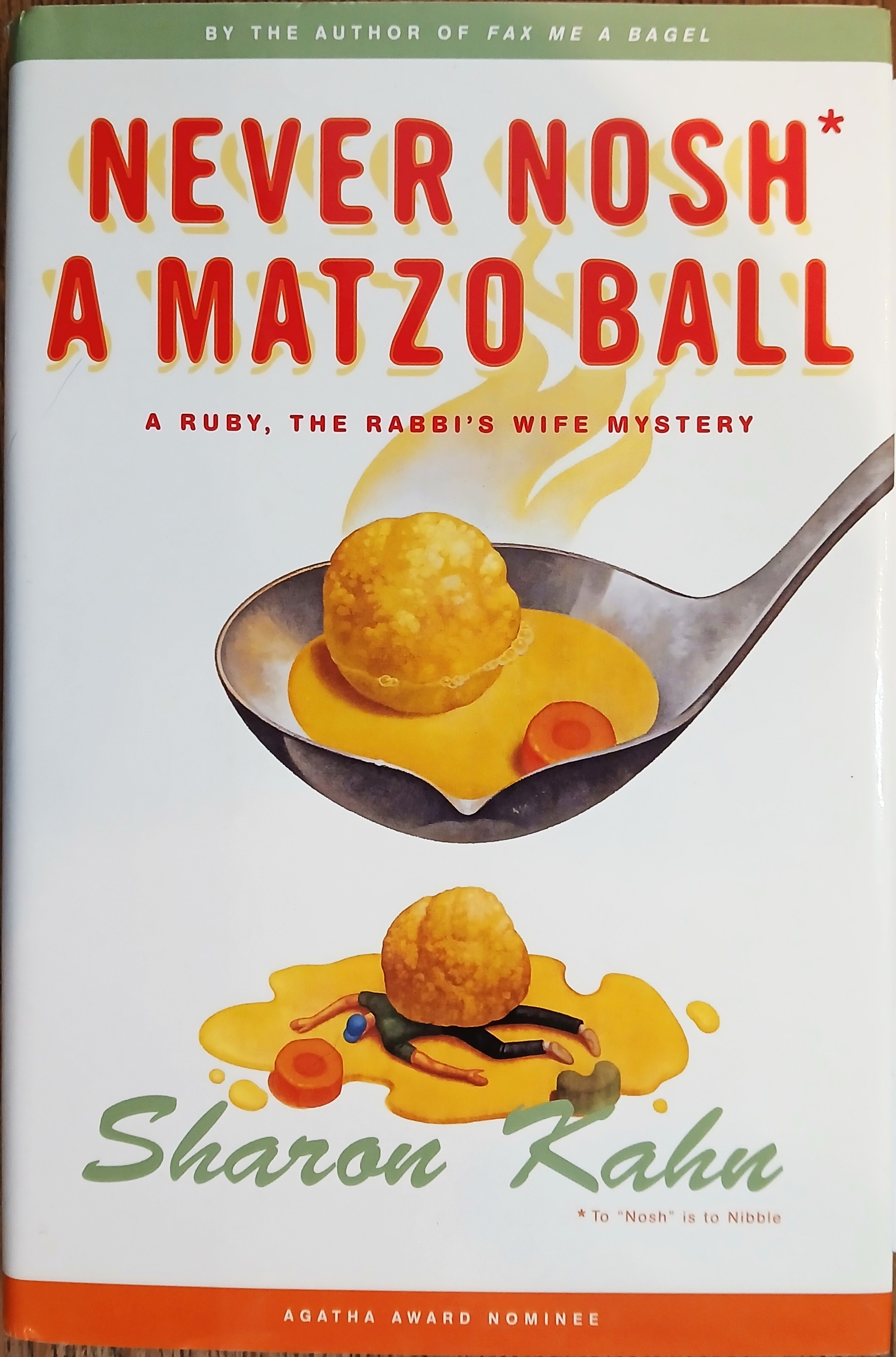 Never Nosh a Matzo Ball (A Ruby, the Rabbi's Wife Mystery)