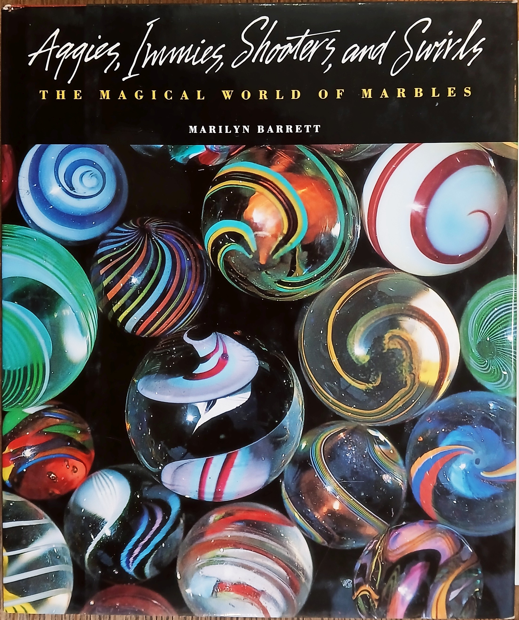 Aggies, Immies, Shooters, and Swirls: The Magical World of Marbles